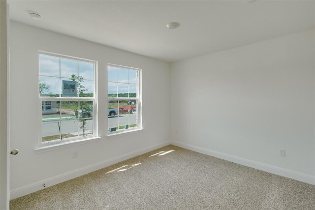 544 Tekoa Dr, Georgetown, TX 78628 - carpeted spare room featuring baseboards