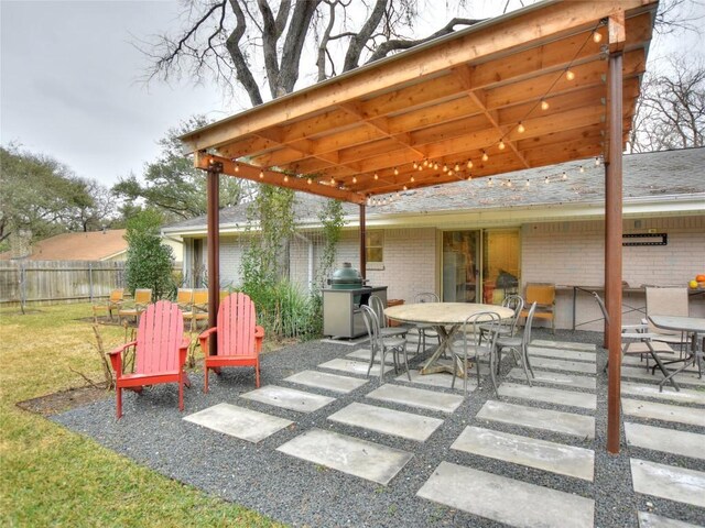 306 Briarwood Trl, Austin, TX 78746 - view of patio / terrace with outdoor dining area and fence