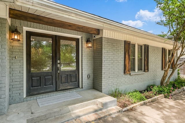 306 Briarwood Trl, Austin, TX 78746 - doorway to property featuring brick siding