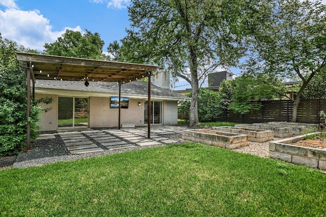 306 Briarwood Trl, Austin, TX 78746 - view of yard featuring a patio, fence, and a garden