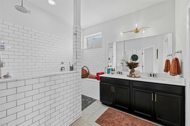 200 Isabella Way, Liberty Hill, TX 78642 - bathroom with tile patterned floors, walk in shower, and double vanity