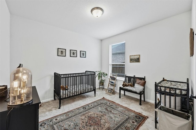 200 Isabella Way, Liberty Hill, TX 78642 - carpeted bedroom featuring baseboards