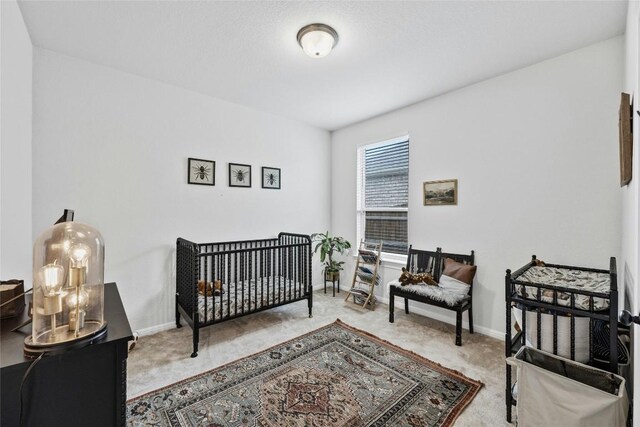 200 Isabella Way, Liberty Hill, TX 78642 - bedroom featuring carpet and baseboards