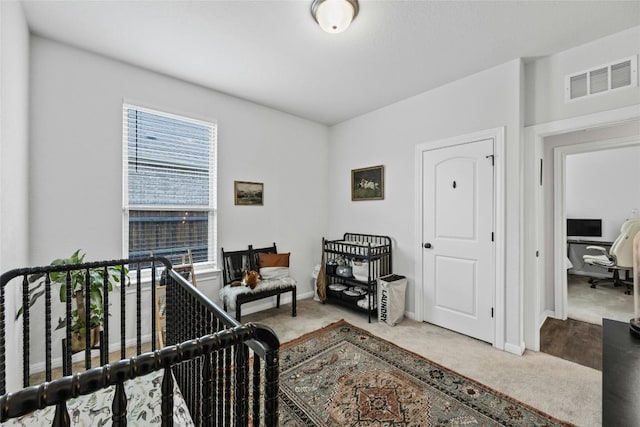 200 Isabella Way, Liberty Hill, TX 78642 - carpeted bedroom with an office area and baseboards
