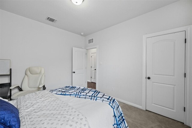 200 Isabella Way, Liberty Hill, TX 78642 - carpeted bedroom with baseboards