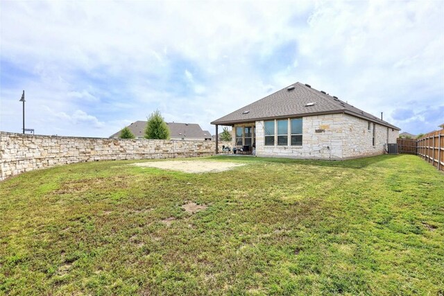200 Isabella Way, Liberty Hill, TX 78642 - rear view of house featuring stone siding and cooling unit