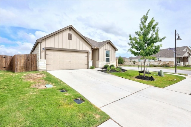 200 Isabella Way, Liberty Hill, TX 78642 - view of front of property with board and batten siding, a garage, stone siding, and driveway