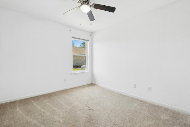 1006 Mapleridge Cir, Leander, TX 78641 - spare room featuring light colored carpet, baseboards, and a ceiling fan