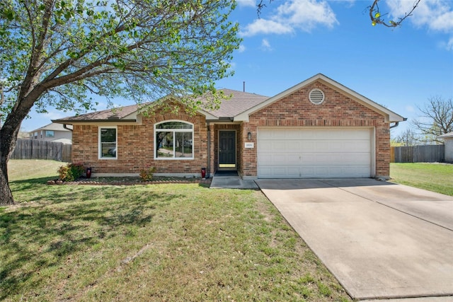 1006 Mapleridge Cir, Leander, TX 78641 - ranch-style home with an attached garage, driveway, brick siding, and a shingled roof