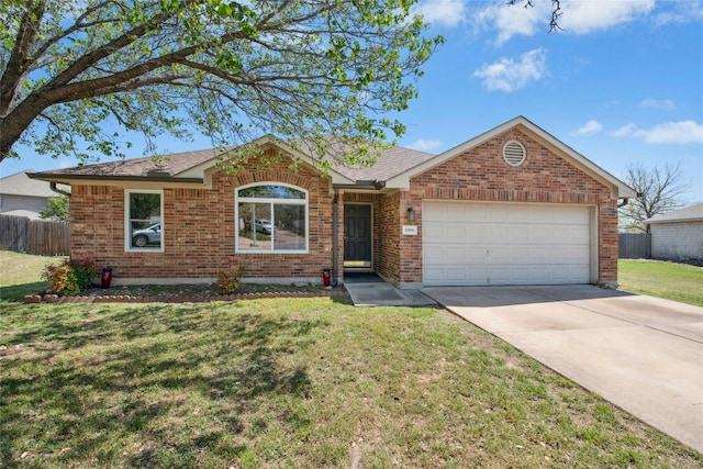 1006 Mapleridge Cir, Leander, TX 78641 - ranch-style home featuring an attached garage, concrete driveway, brick siding, and roof with shingles