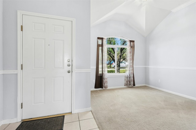 1006 Mapleridge Cir, Leander, TX 78641 - carpeted entrance foyer with vaulted ceiling, baseboards, and tile patterned floors