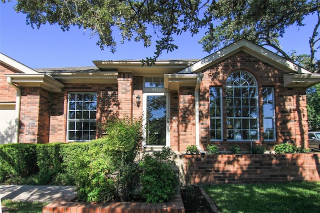 view of front of property with brick siding