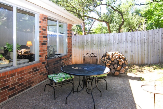 view of patio / terrace with fence