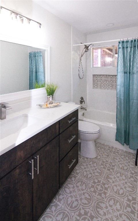 bathroom with shower / bath combo with shower curtain, toilet, and vanity