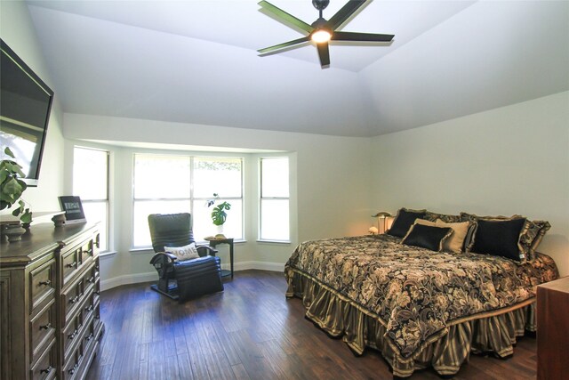8102 Davis Mountain Pass, Austin, TX 78726 - bedroom featuring dark wood-type flooring, vaulted ceiling, and a ceiling fan