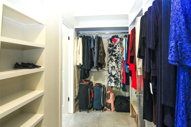 spacious closet with tile patterned flooring