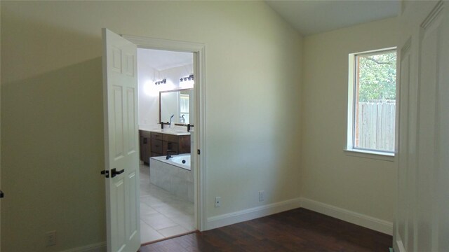 8102 Davis Mountain Pass, Austin, TX 78726 - walk in closet featuring tile patterned flooring