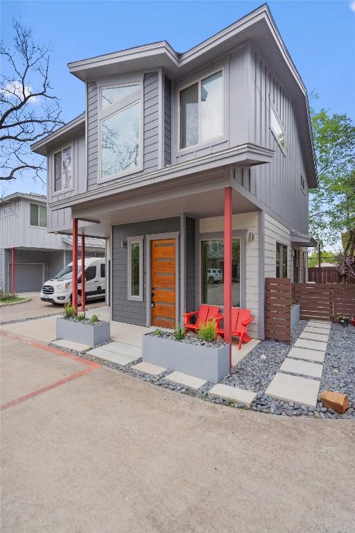 900 Banister Ln Unit D, Austin, TX 78704 - view of front facade with a porch and board and batten siding