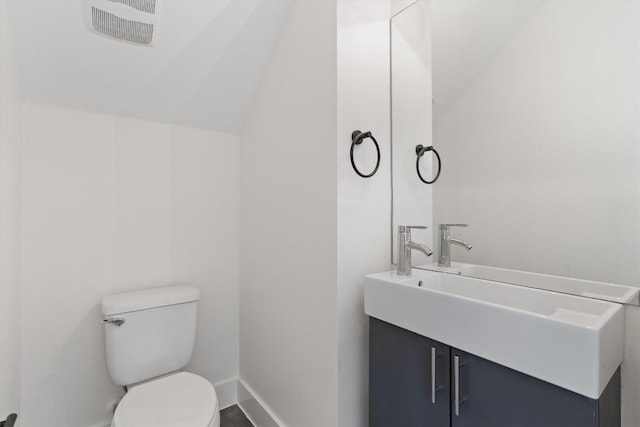 900 Banister Ln Unit D, Austin, TX 78704 - bathroom with vanity and lofted ceiling