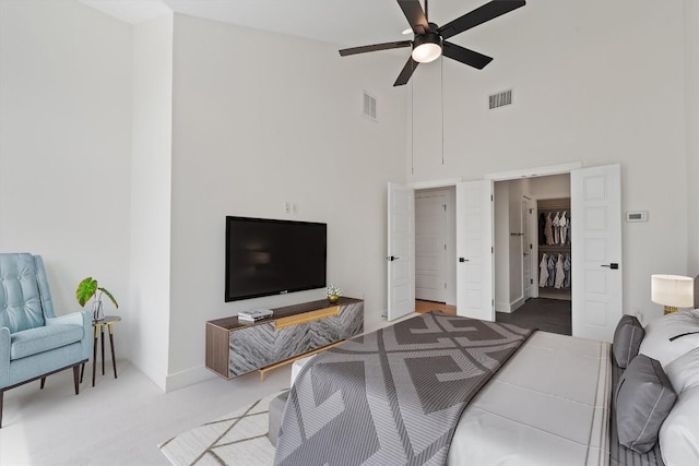 900 Banister Ln Unit D, Austin, TX 78704 - carpeted bedroom featuring high vaulted ceiling and a ceiling fan