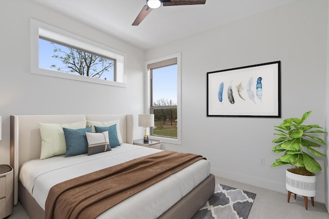 900 Banister Ln Unit D, Austin, TX 78704 - carpeted bedroom with ceiling fan and baseboards