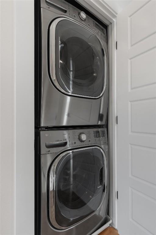 900 Banister Ln Unit D, Austin, TX 78704 - laundry area featuring stacked washer / dryer