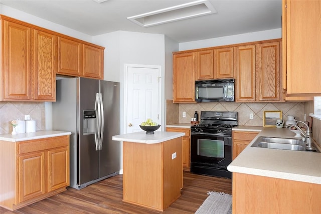 3100 Lynnbrook Dr, Austin, TX 78748 - kitchen featuring black appliances, a sink, backsplash, and dark wood-type flooring