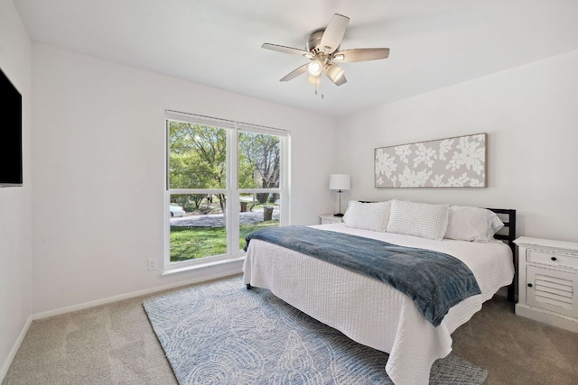 5304 Harvest Ln, Austin, TX 78745 - carpeted bedroom featuring multiple windows, baseboards, and ceiling fan