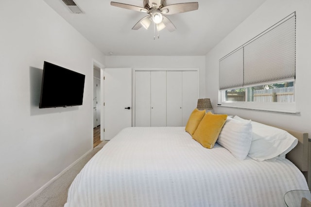 5304 Harvest Ln, Austin, TX 78745 - bedroom featuring a closet, baseboards, carpet flooring, and a ceiling fan