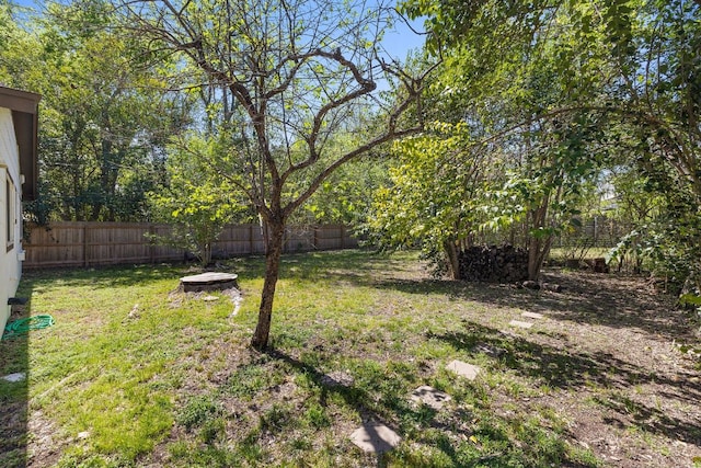 view of yard with fence