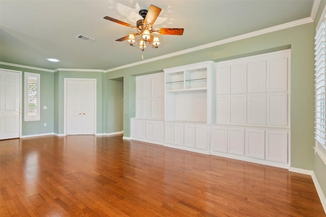 111 Belfalls Dr, Georgetown, TX 78633 - unfurnished living room featuring wood finished floors, baseboards, ceiling fan, crown molding, and recessed lighting