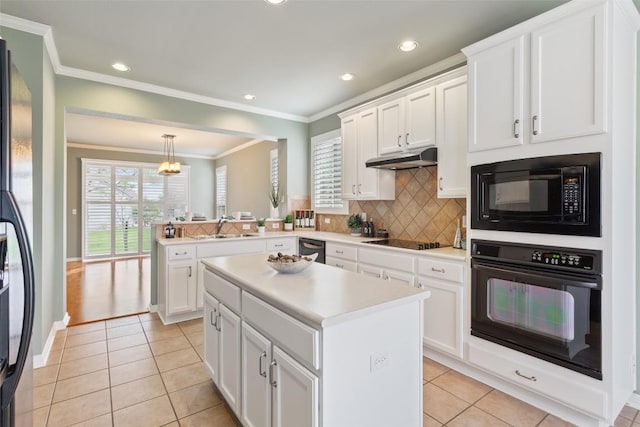 111 Belfalls Dr, Georgetown, TX 78633 - kitchen featuring black appliances, a sink, light tile patterned flooring, decorative backsplash, and light countertops