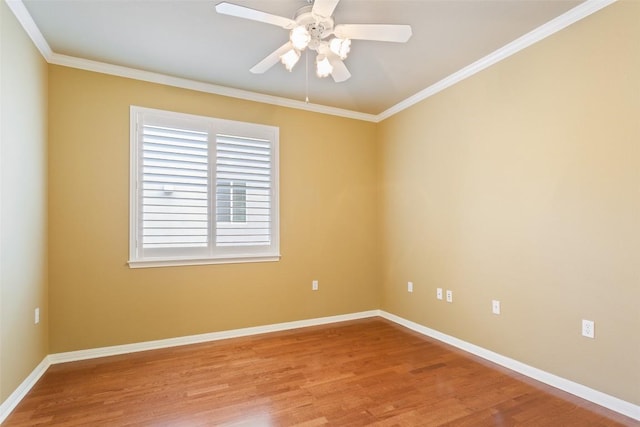 111 Belfalls Dr, Georgetown, TX 78633 - unfurnished room featuring wood finished floors, ceiling fan, baseboards, and crown molding