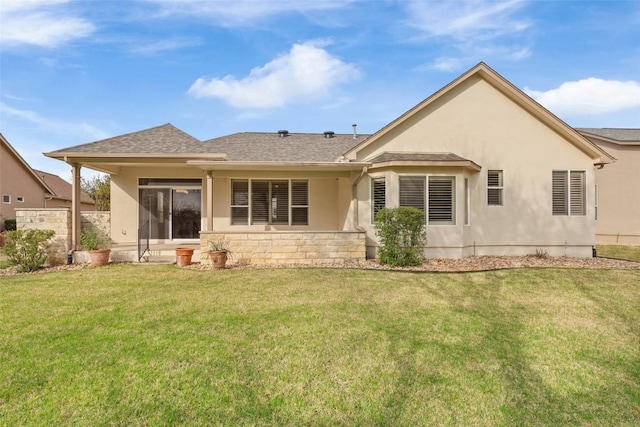 111 Belfalls Dr, Georgetown, TX 78633 - rear view of property featuring stucco siding, a yard, and roof with shingles