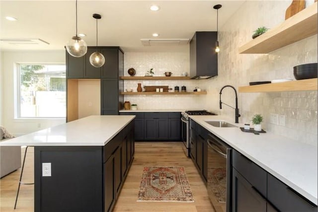 504 Normandy St Unit A, Austin, TX 78745 - kitchen with open shelves, a sink, stainless steel appliances, light wood-type flooring, and decorative backsplash