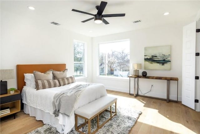 504 Normandy St Unit A, Austin, TX 78745 - bedroom featuring wood finished floors, recessed lighting, a ceiling fan, and baseboards
