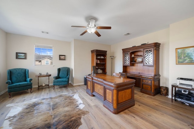 7901 SW Pkwy Unit 21, Austin, TX 78735 - office area featuring a ceiling fan, light wood-type flooring, and baseboards