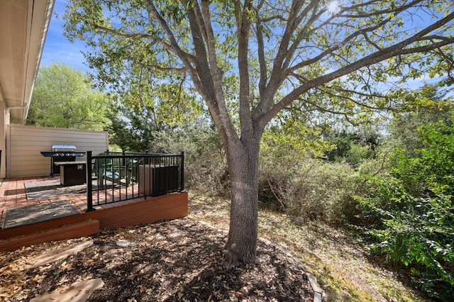 7901 SW Pkwy Unit 21, Austin, TX 78735 - view of yard with a deck
