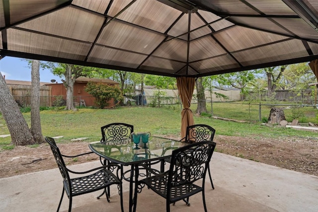 1113 Plymouth Dr, Austin, TX 78758 - view of patio featuring outdoor dining area and a gazebo