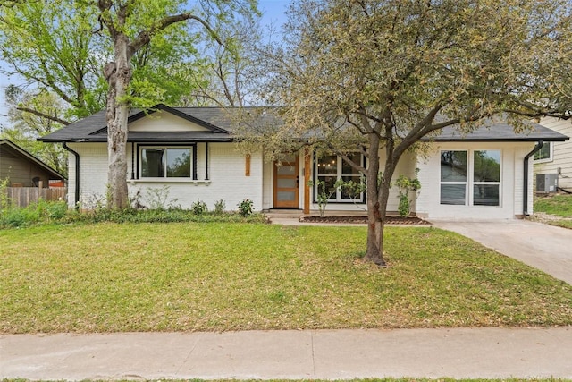 1113 Plymouth Dr, Austin, TX 78758 - view of front of home with central air condition unit and brick siding