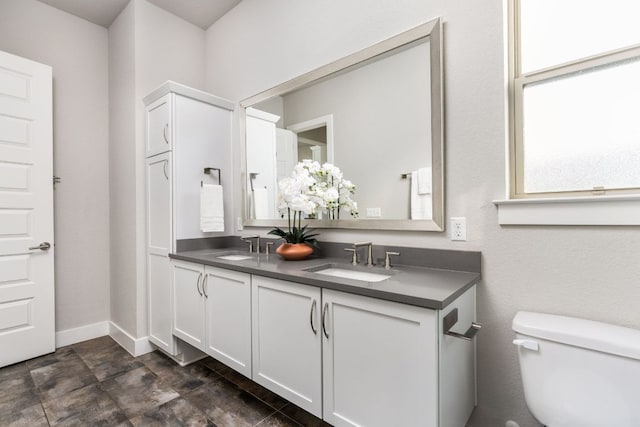 404 W Alpine Rd Unit 1, Austin, TX 78704 - bathroom with double vanity and toilet