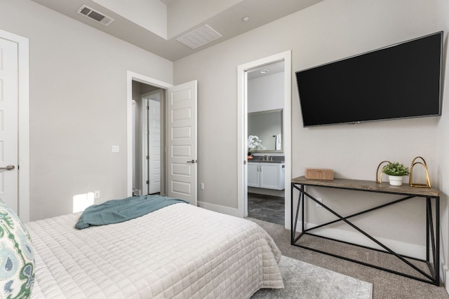 404 W Alpine Rd Unit 1, Austin, TX 78704 - carpeted bedroom featuring ensuite bathroom