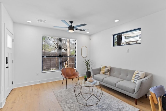 2102 Eva St Unit 2, Austin, TX 78704 - living area featuring healthy amount of natural light, a ceiling fan, light wood finished floors, and recessed lighting