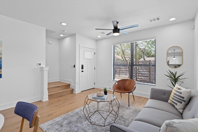 2102 Eva St Unit 2, Austin, TX 78704 - living room featuring ceiling fan, stairs, light wood finished floors, and recessed lighting