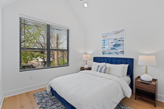 2102 Eva St Unit 2, Austin, TX 78704 - bedroom featuring lofted ceiling, wood finished floors, and recessed lighting