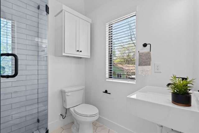 2102 Eva St Unit 2, Austin, TX 78704 - bathroom featuring tile patterned floors and a shower
