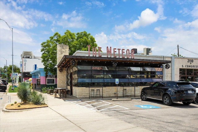 2102 Eva St Unit 2, Austin, TX 78704 - view of commercial property with uncovered parking