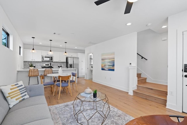 2102 Eva St Unit 2, Austin, TX 78704 - living area with recessed lighting, stairway, light wood-type flooring, and ceiling fan