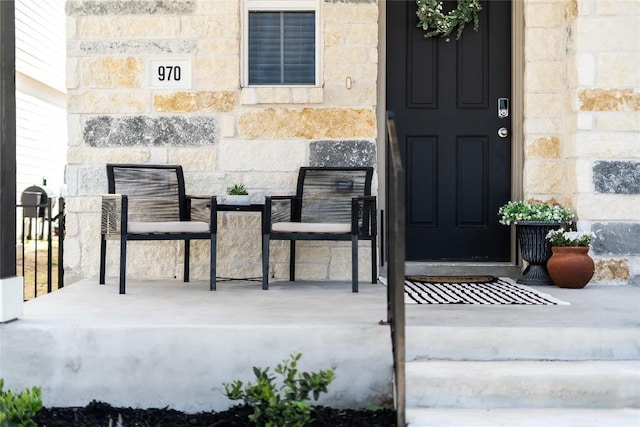 970 Lone Peak Way, Dripping Springs, TX 78620 - property entrance featuring stone siding