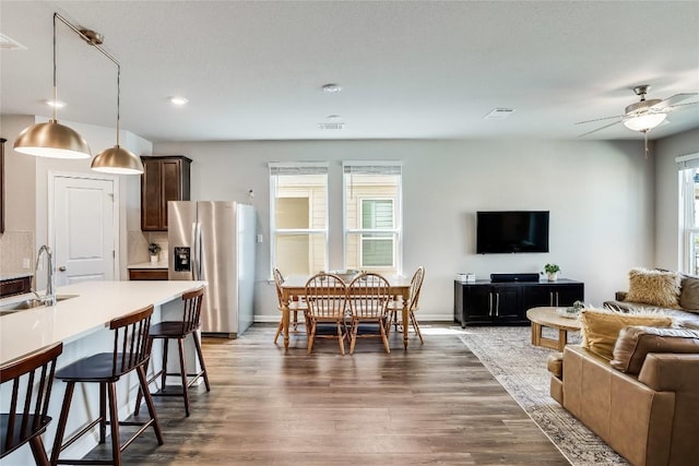 970 Lone Peak Way, Dripping Springs, TX 78620 - living room with wood finished floors, ceiling fan, recessed lighting, and baseboards